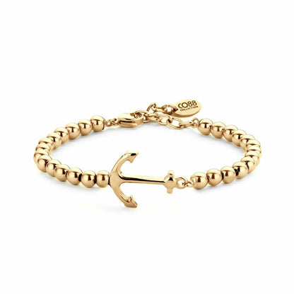 Detail van de gouden CO88 Collection armband met een schattige ankerhanger.