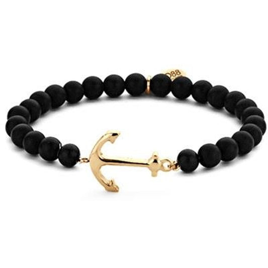 Zwarte CO88 Collection armband met gouden anker, elegant accessoire voor dames.