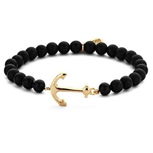 Zwarte CO88 Collection armband met gouden anker, elegant en stijlvol accessoire voor dames.