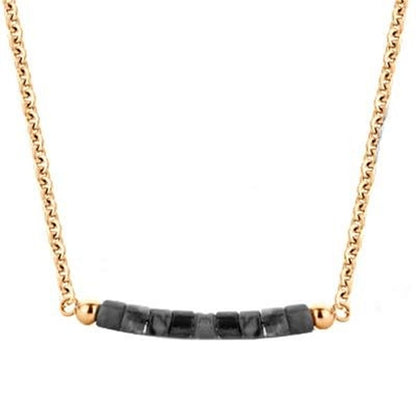 Gouden CO88 Collection damesketting met elegante zwarte stenen in het midden.