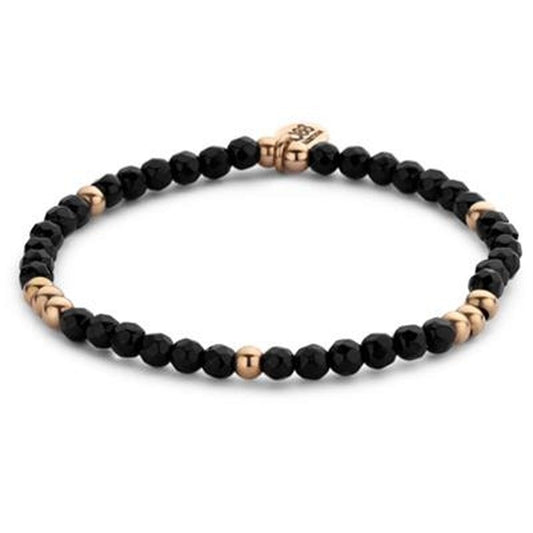 Elegante zwarte CO88 Collection armband voor dames met gouden accenten.