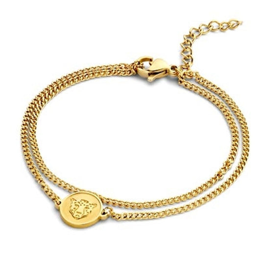 Gouden CO88 Collection armband met elegante schakels en een ronde medaille.