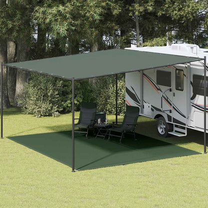 Donkergroen vidaXL tenttapijt van 400x500 cm onder een caravanluifel in de tuin.
