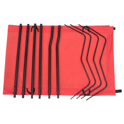 Detail van de zwarte stalen frameonderdelen van het vidaXL campingbed op een rode ondergrond.