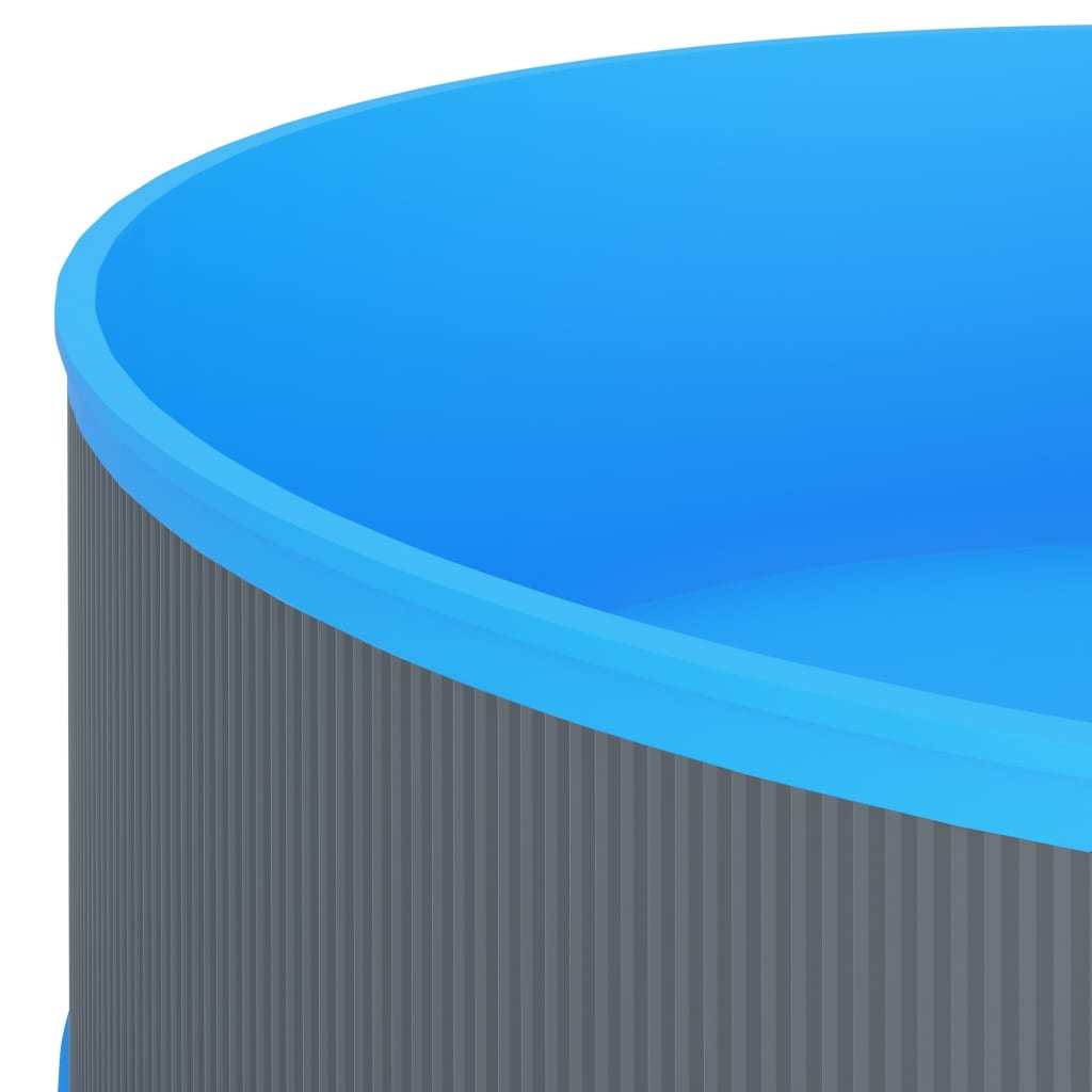 Detail van de grijze stalen wand en blauwe PVC-voering van de vidaXL Splasher pool.