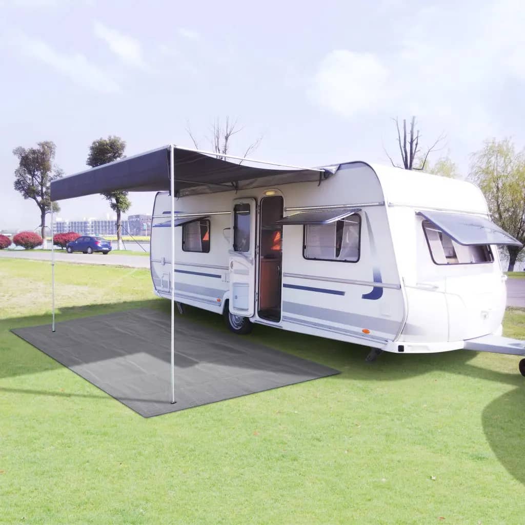 Tenttapijt vidaXL 250x550 cm in ademend lichtgrijs onder een caravan op gras.