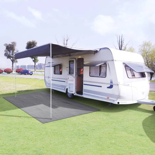 Tenttapijt vidaXL 250x550 cm in ademend lichtgrijs onder een caravan op gras.