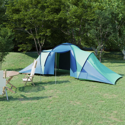 Blauwe en groene vidaXL tent voor 6 personen, opgezet in een groene omgeving.