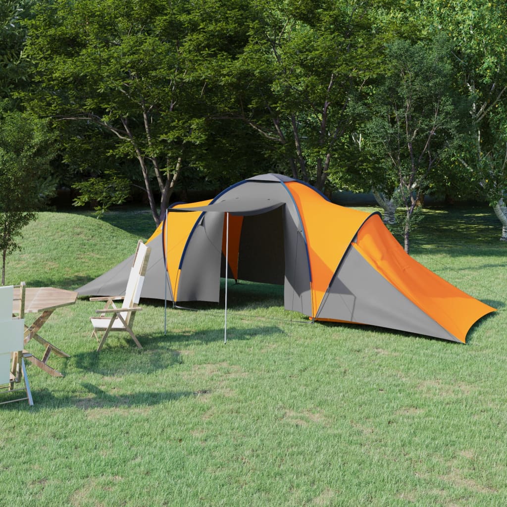 Grijze en oranje vidaXL tent voor 6 personen, opgezet in een groene omgeving.