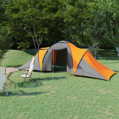 Grijze en oranje vidaXL tent voor 6 personen, opgezet in een groene omgeving.