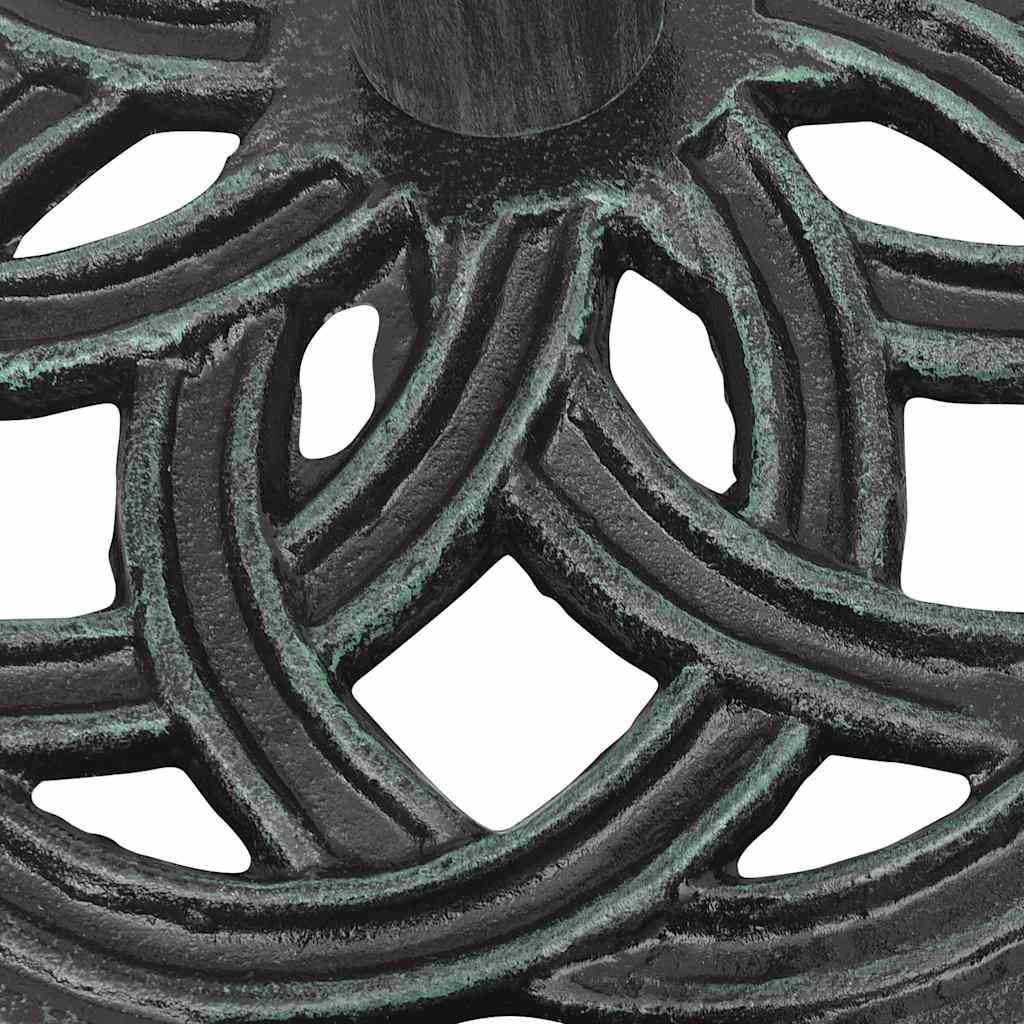 Detail van het gietijzeren patroon van de vidaXL parasolvoet in groen.