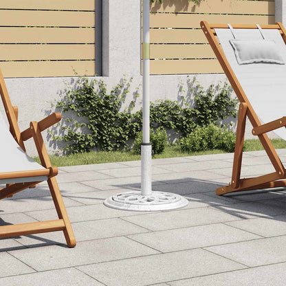 Witte vidaXL parasolvoet van gietijzer met elegant krulwerk, geplaatst op een terras.