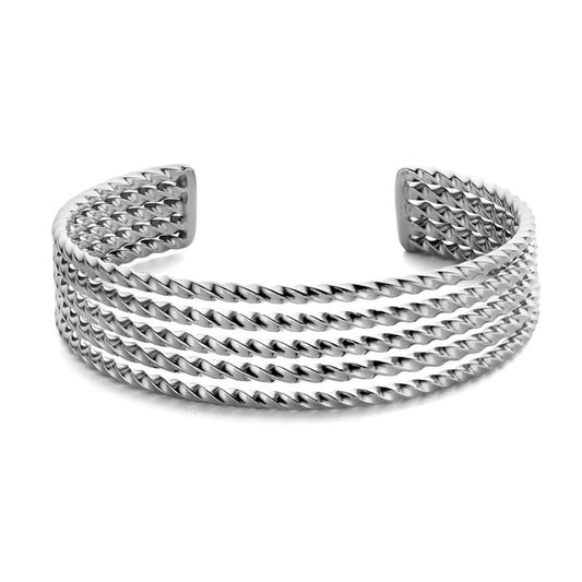 Zilverkleurige CO88 Collection armband voor dames met elegant design en gedraaid patroon.
