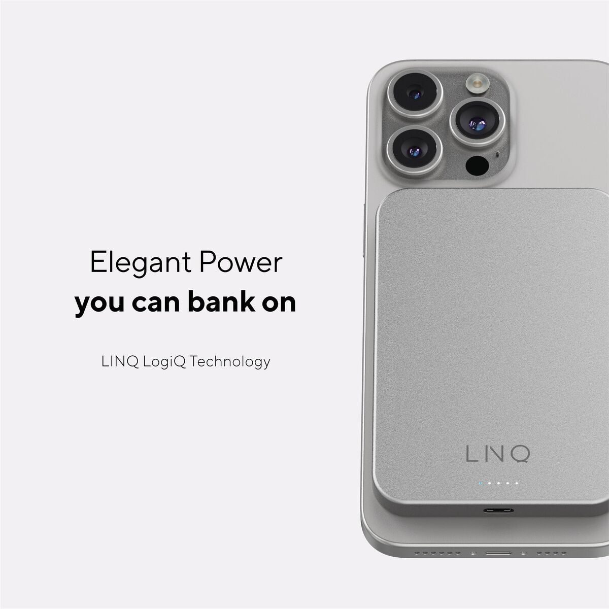 Detail van de zilverkleurige Linq Byelements Powerbank, bevestigd op een smartphone.