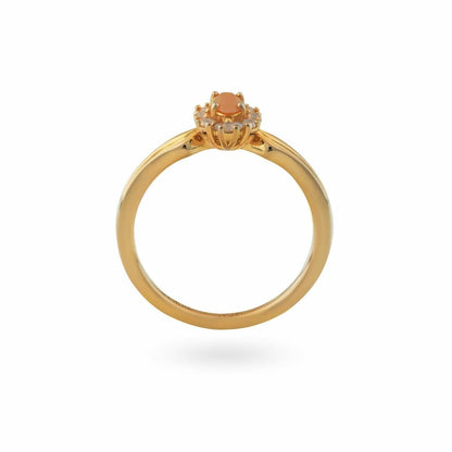 Gouden 24KAE ring voor dames met elegante afwerking en een verfijnde steen.