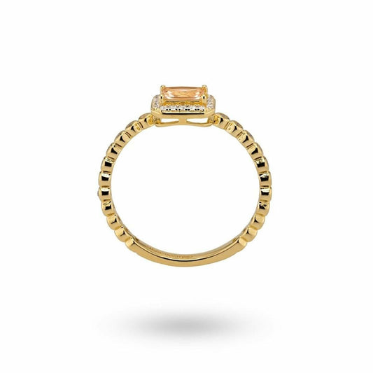 Gouden 24KAE ring voor dames met een elegante, facetten geslepen steen en gedetailleerde band.