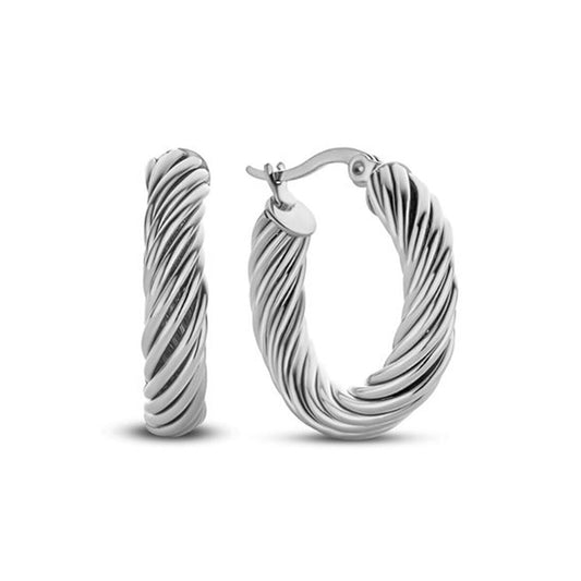 Zilverkleurige CO88 Collection oorbellen met elegant gedraaid ontwerp.
