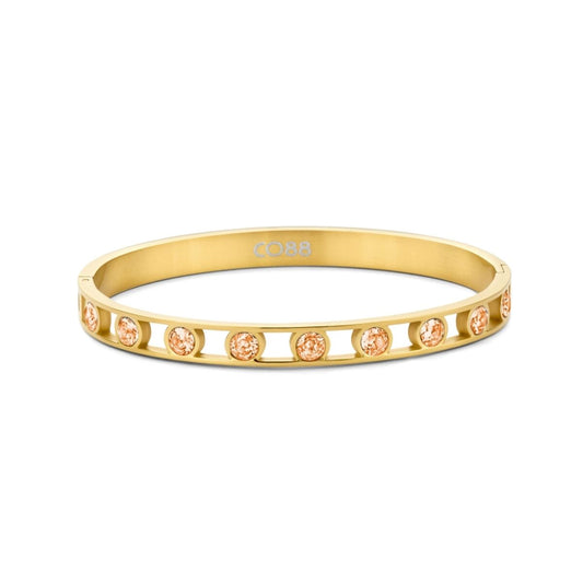 Gouden CO88 Collection armband voor dames met elegante stenen in een strak design.