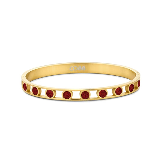 Gouden CO88 Collection armband met elegante afwerking en rode details.