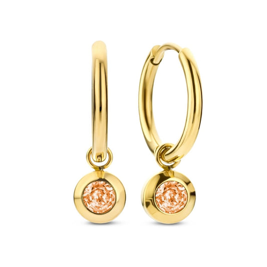 Gouden CO88 Collection oorbellen met een elegante, oranje steentje aan de onderkant.