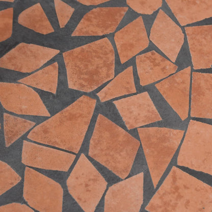 Detail van het terracottakleurige oppervlak met keramische tegels van de vidaXL parasolvoet.