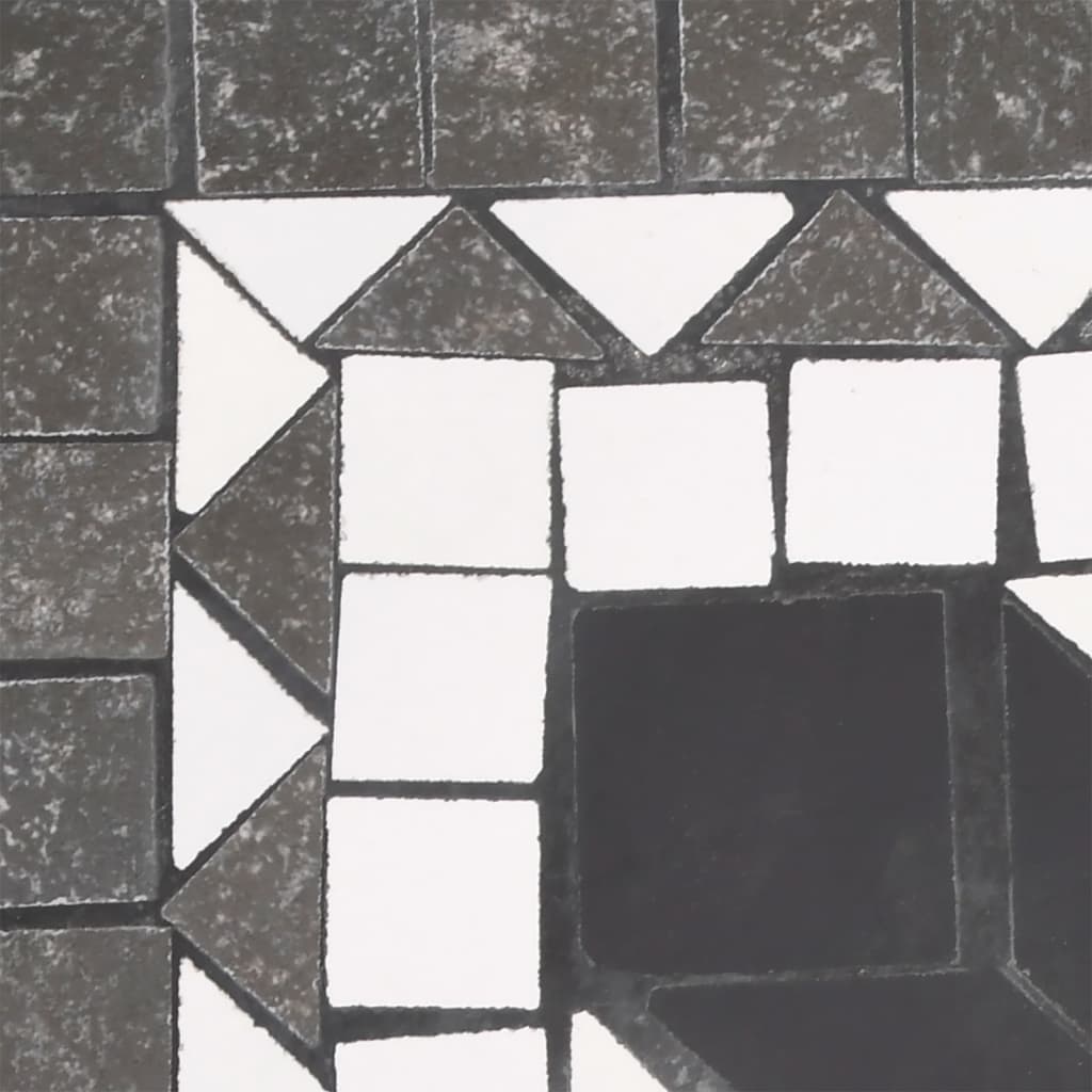 Detail van het ceramische tegeloppervlak van de vidaXL parasolvoet in zwart en wit.