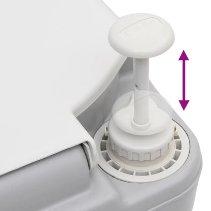 Detail van de zuigpomp van het vidaXL campingtoilet voor effectieve reiniging.