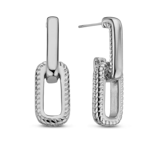 Zilverkleurige CO88 Collection oorbellen met trendy design en gedetailleerde rand.