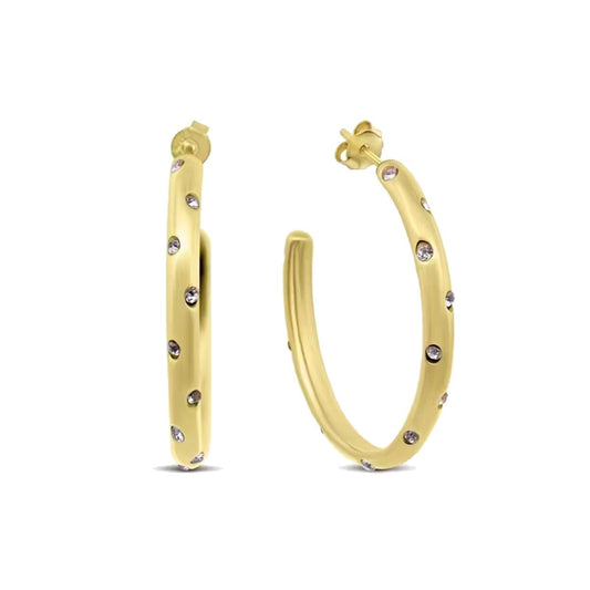 Gouden CO88 Collection oorbellen met elegante afwerking en fonkelende details.