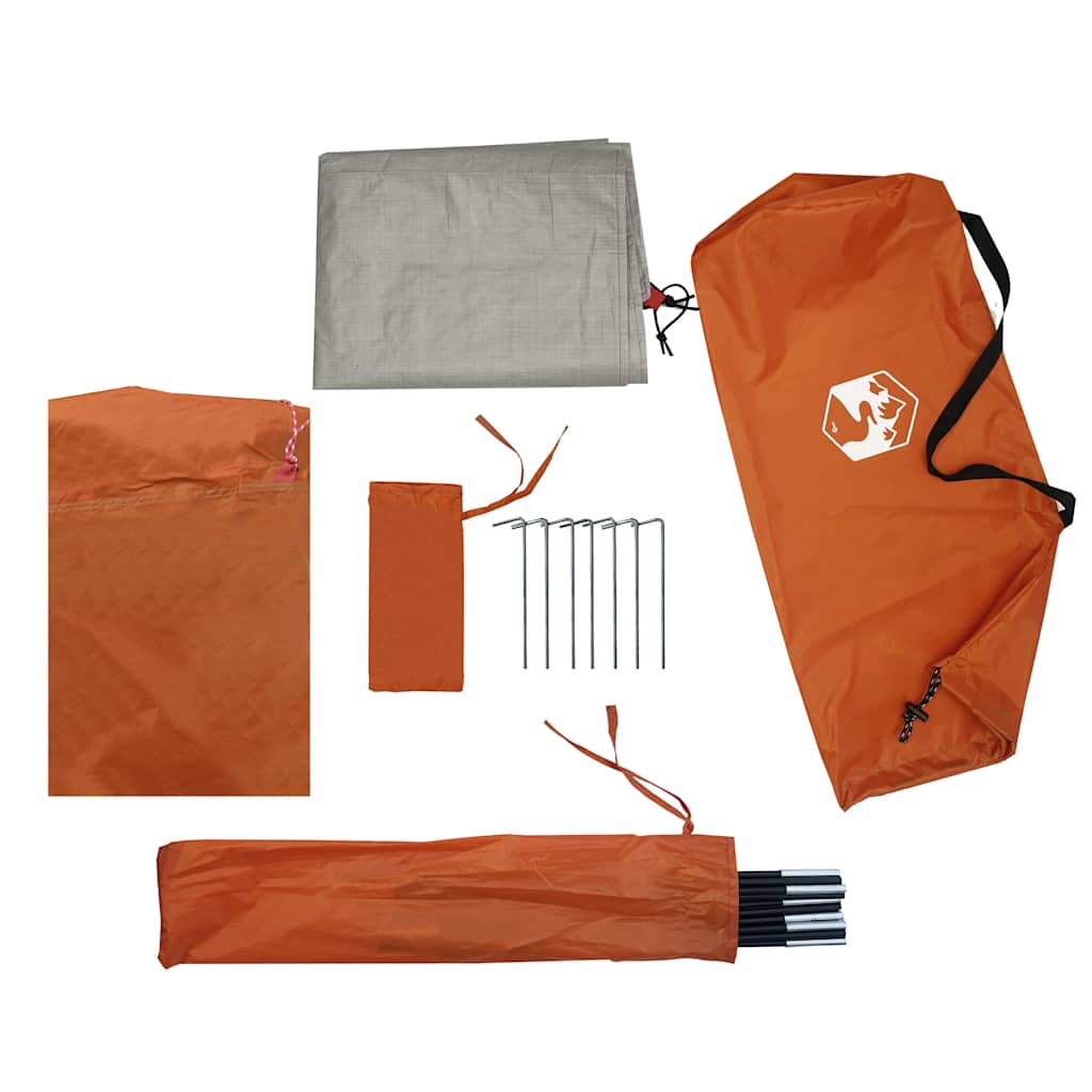 Detail van de vidaXL koepeltent met oranje tentdoek, stokken en haringen.