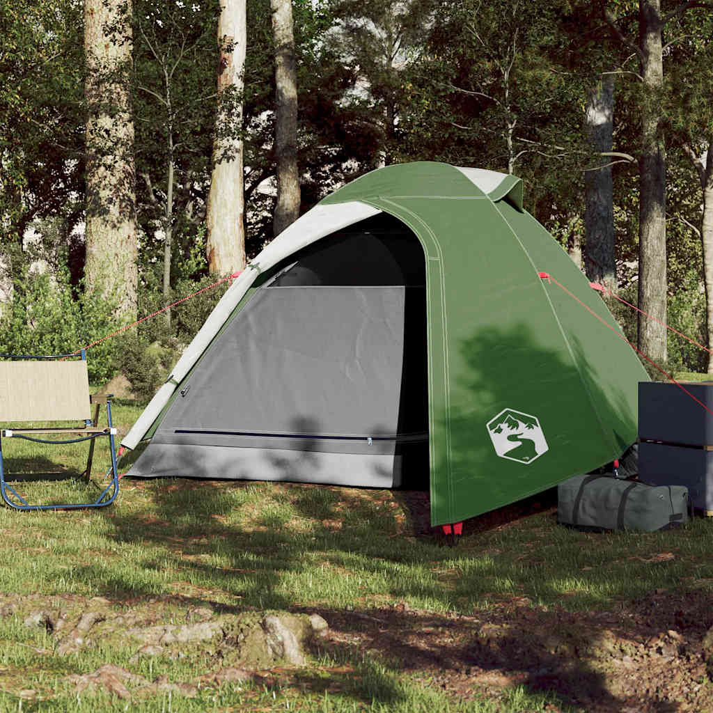 Zijaanzicht van de vidaXL koepeltent in groen, geplaatst in een bosrijke omgeving.