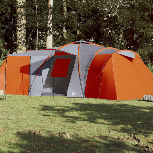 Grijze en oranje vidaXL koepeltent voor 12 personen, opgesteld in een groene omgeving.