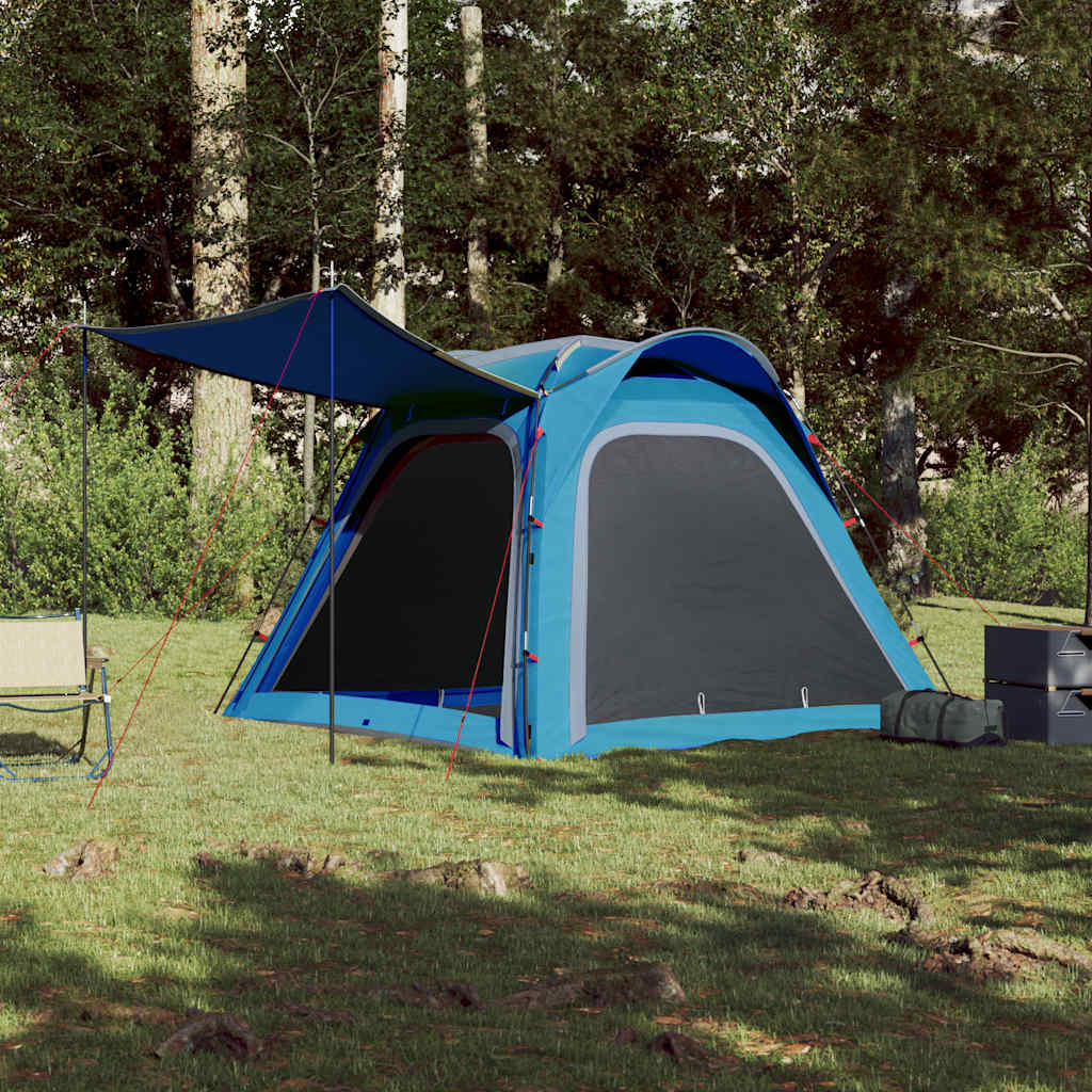 Zijaanzicht van de vidaXL 4-persoons tent met blauw doek en luifel in de natuur.