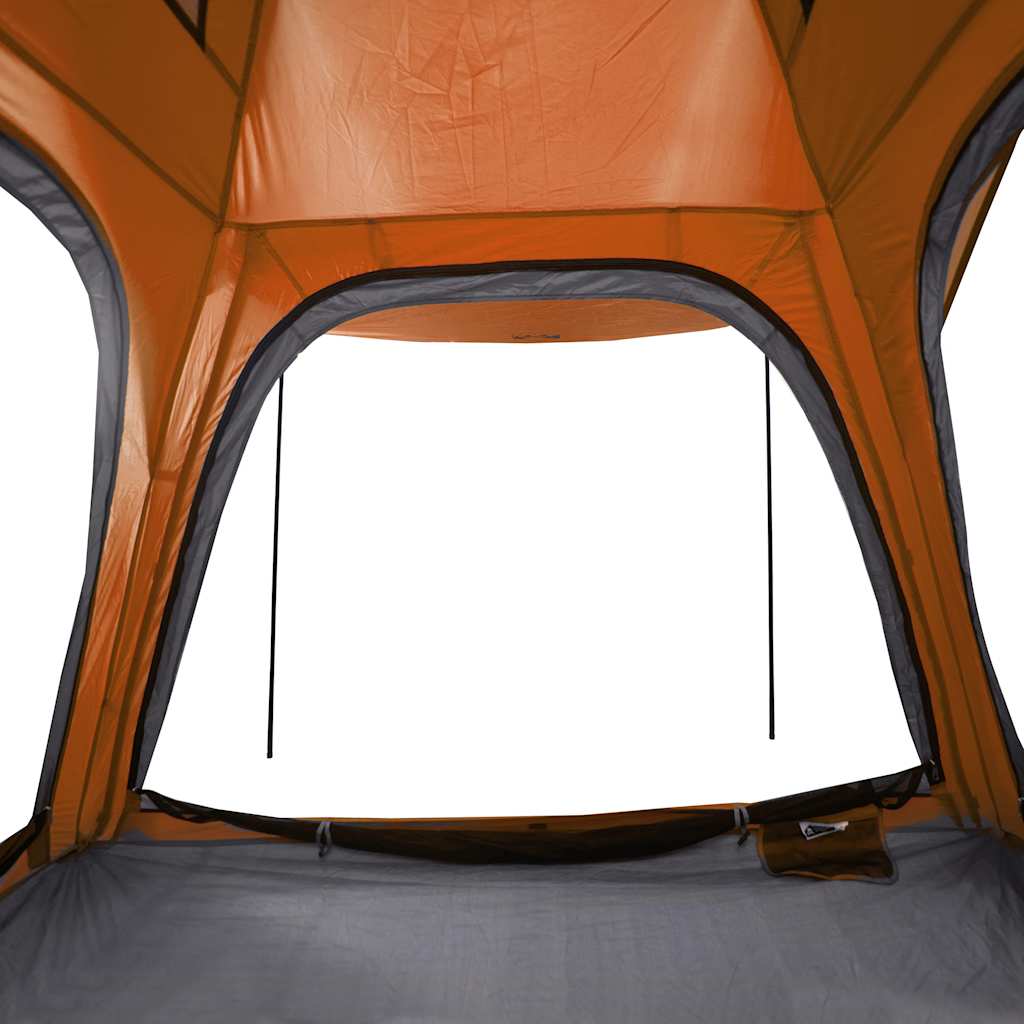Detail van de grijze en oranje tent met gaaswanden voor optimale ventilatie.