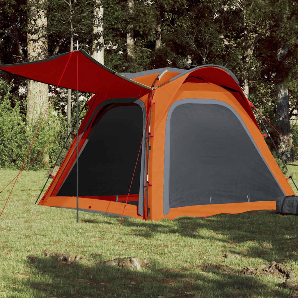 Tent vidaXL 4-persoons grijs met oranje details, opgesteld in een groene omgeving.