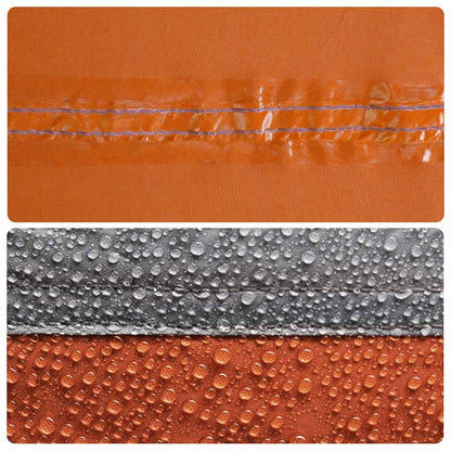 Detail van de waterdichte naden en druppels op de grijze en oranje tent van vidaXL.
