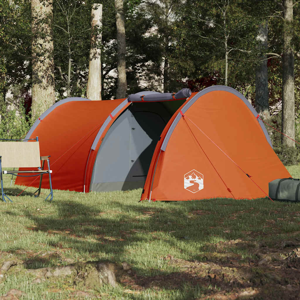 Zijaanzicht van de vidaXL 4-persoons tunneltent in oranje, opgesteld in de natuur.