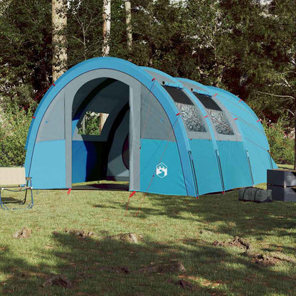 Zijaanzicht van de vidaXL 4-persoons tunneltent in blauw, met ventilatieroosters en tentstokken.