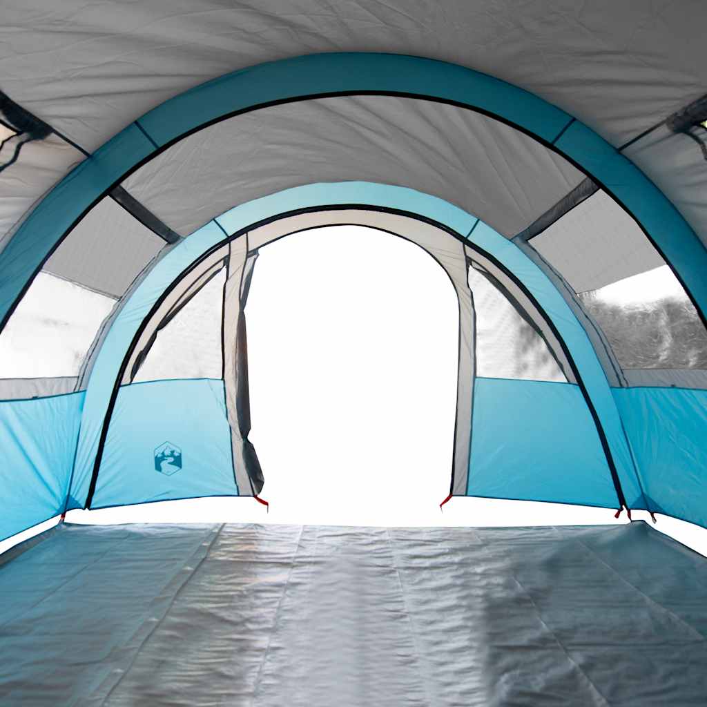 Zijaanzicht van de blauwe vidaXL tunneltent met open deur en gaasventilatie.