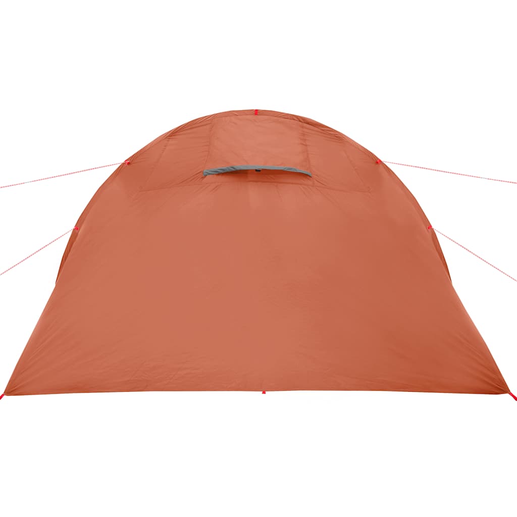 Detail van de grijze en oranje tunneltent met een ventilatierooster aan de bovenkant.