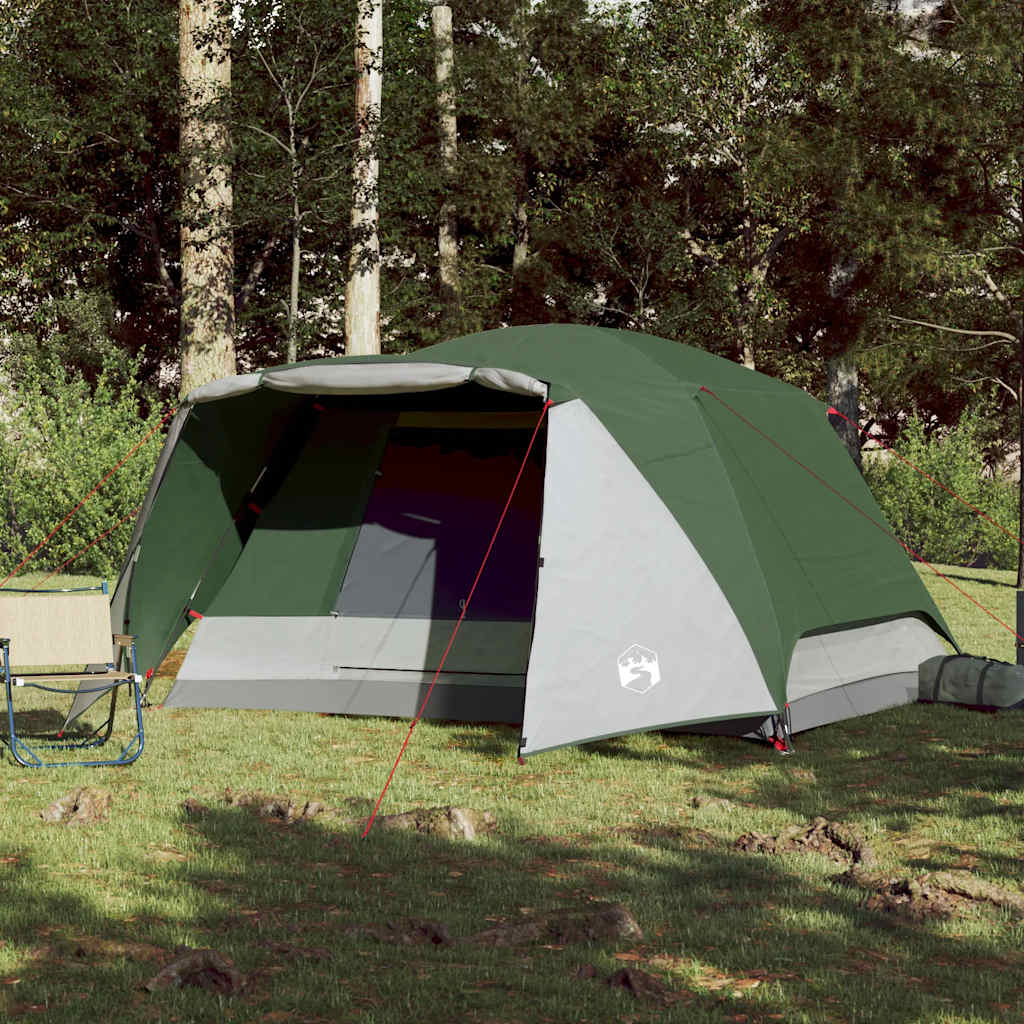 Detail van de groene vidaXL 4-persoons tent met luifel, zijaanzicht in de natuur.