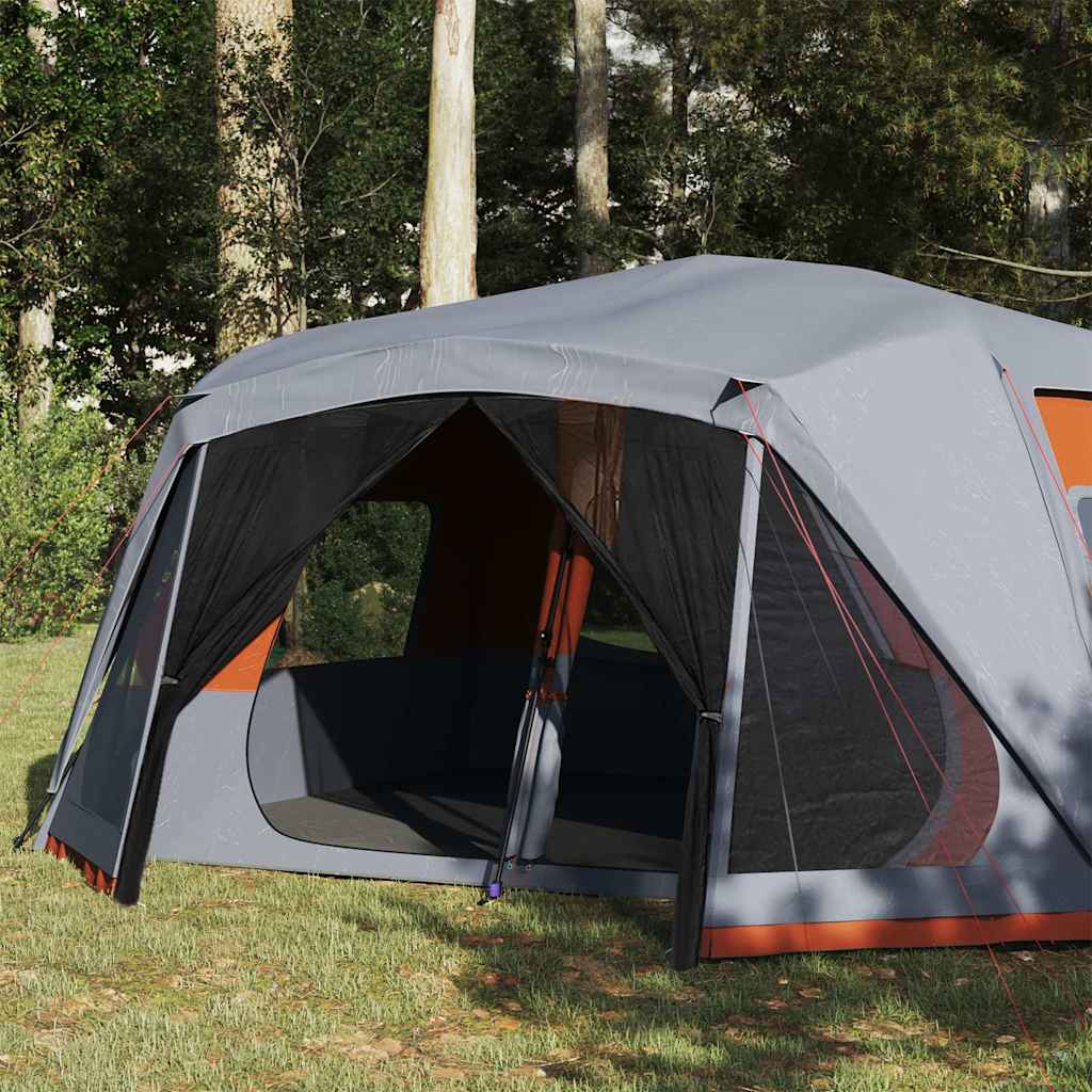 Detail van de grijze vidaXL tent met oranje accenten en open ingang.