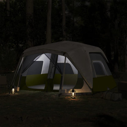 Detail van de vidaXL tent met LED-verlichting, lichtgroen, in de avond met sfeerverlichting.