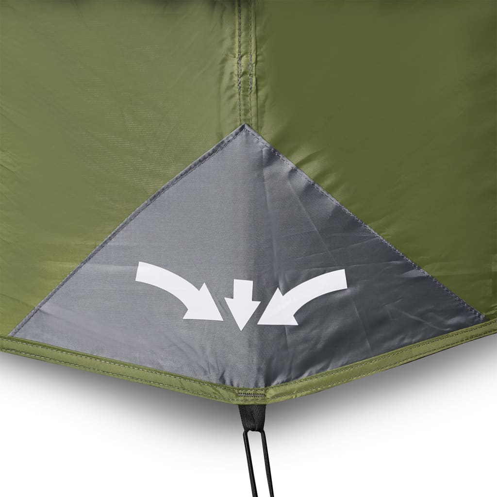 Detail van de lichtgroene tent met waterdichte hoek en bevestigingsinstructies.