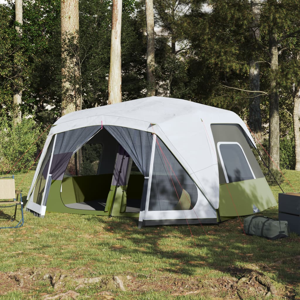 Lichtgroene vidaXL tent voor 10 personen met LED-verlichting, zijaanzicht in de natuur.