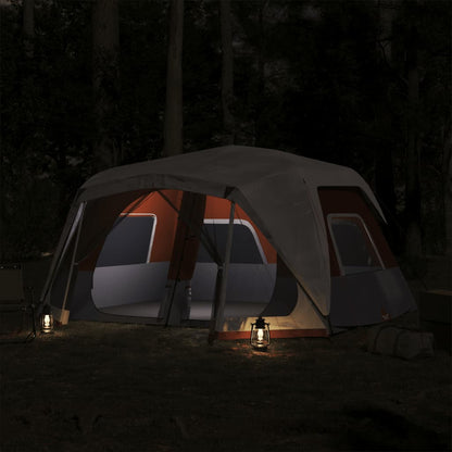 Tent vidaXL 10-persoons met LED verlichting, zijaanzicht in de avond met sfeervolle lantaarns.