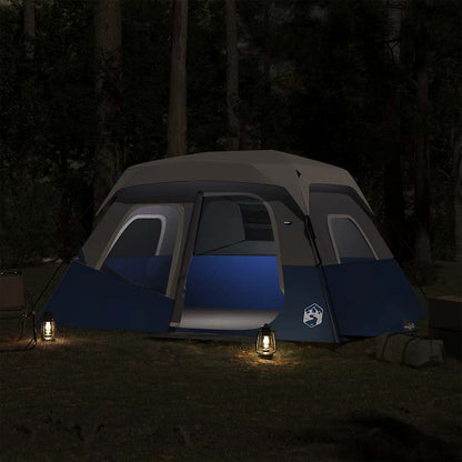 Lichtblauwe vidaXL tent met open voordeur en LED-verlichting in een bosrijke omgeving.