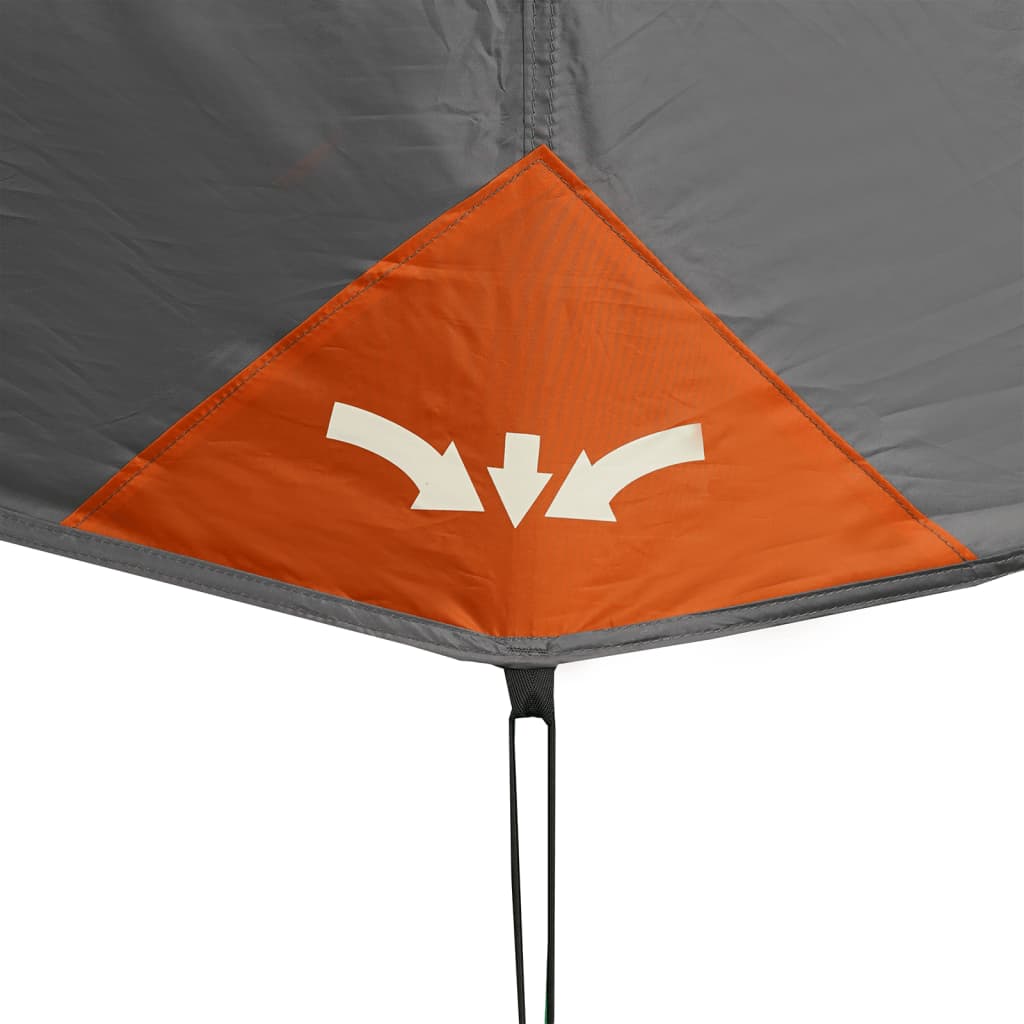 Detail van de oranje hoek met logo en bevestigingspunt van de vidaXL tent.
