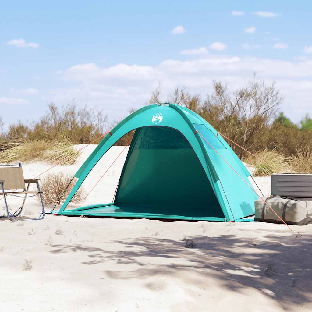 Detail van de vidaXL zeegroene strandtent met open ingang op het zand.