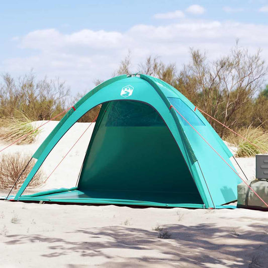 Zeegroen vidaXL strandtent met waterdichte stof en stabiliteitsvoorzieningen op het strand.